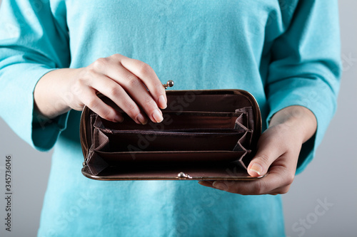 sad woman hand empty wallet