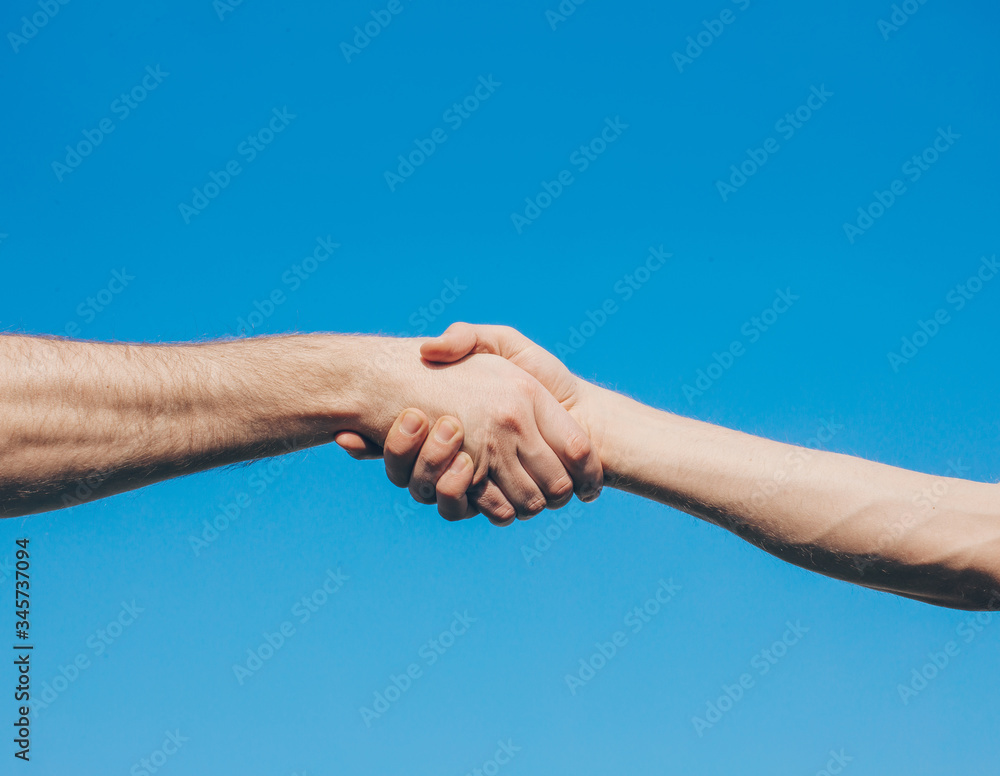 Business mans hands. Sky background. Hand. Man strong. Motivation. Energy. Business mans hands. Sky background. Hand. Man strong. Motivation. Energy.
