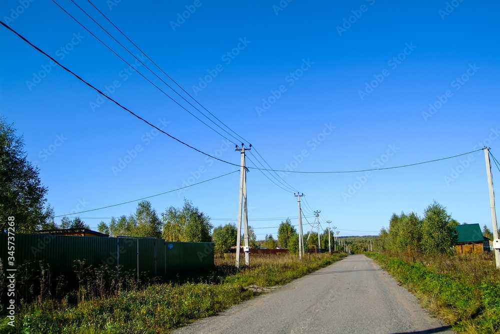 concrete pole with electric wires in the village, Russia