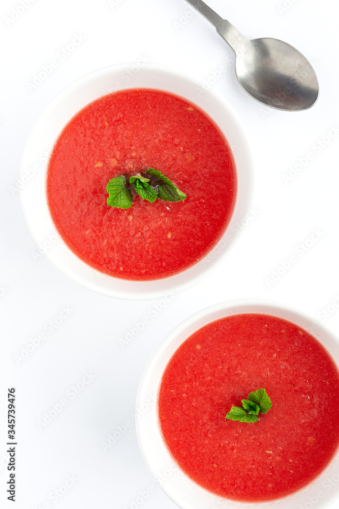 Fresh watermelon mint juice on white background from above Fresh watermelon mint juice on white background from above