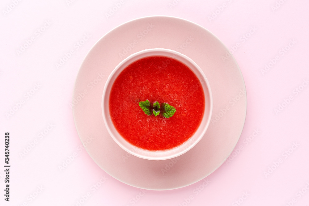 Fresh watermelon mint juice on pink background from above Fresh watermelon mint juice on pink background from above