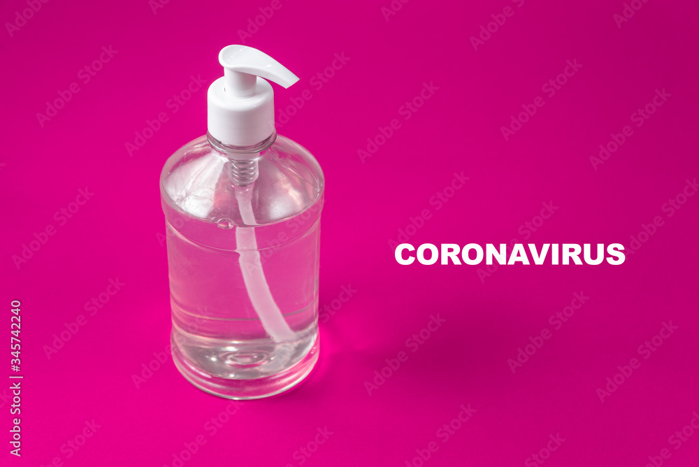 Container with alcohol gel on the red background Container with alcohol gel on the red background