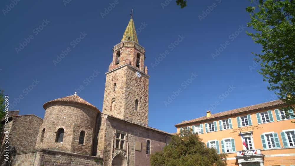 View on the bell tower of the Frejus Cathedral on a sunny day in Frejus, France View on the bell tower of the Frejus Cathedral on a sunny day in Frejus, France