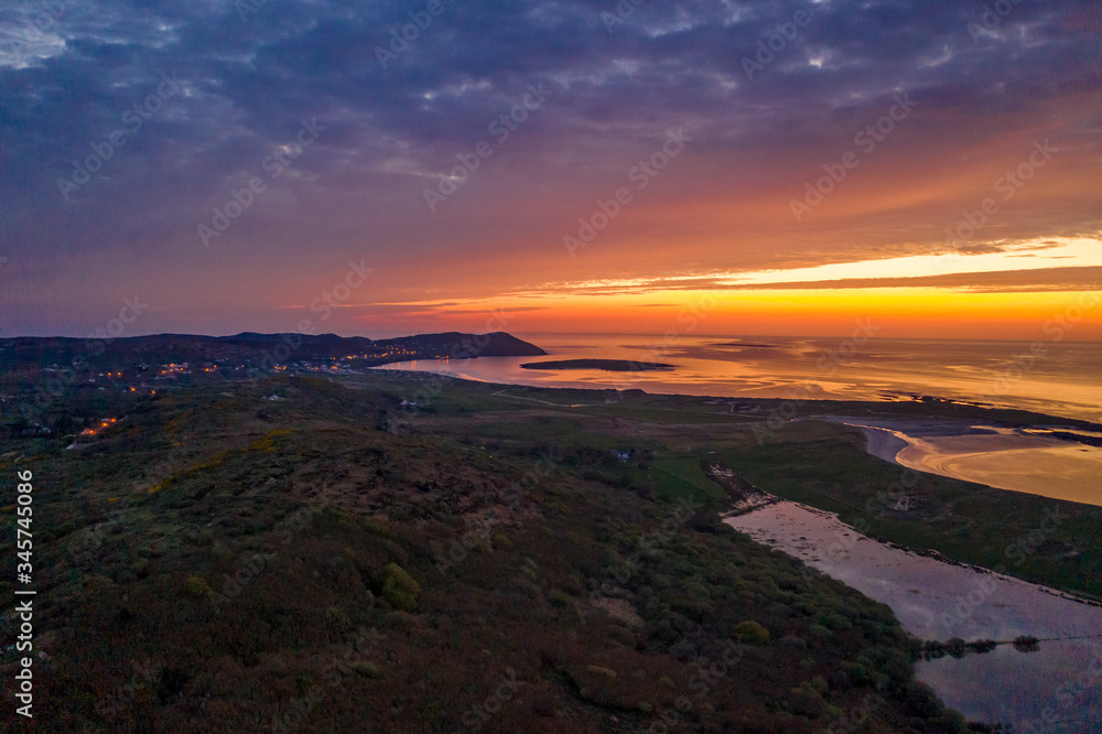 Fototapeta premium Aerial of sunset above Clooney, Narin and Portnoo in County Donegal - Ireland.