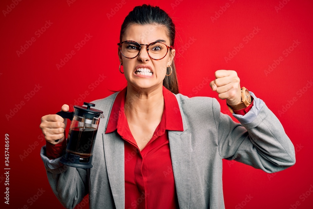 Young beautiful brunette woman doing coffe holding french coffeemaker over red background annoyed and frustrated shouting with anger, crazy and yelling with raised hand, anger concept Young beautiful brunette woman doing coffe holding french coffeemaker over red background annoyed and frustrated shouting with anger, crazy and yelling with raised hand, anger concept