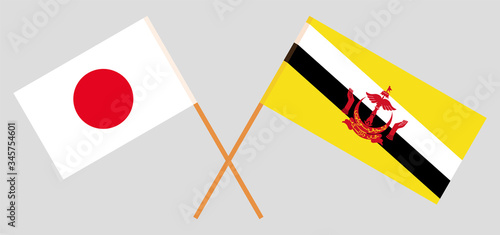 Crossed flags of Brunei and Japan