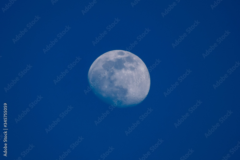 full moon over blue sky full moon over blue sky