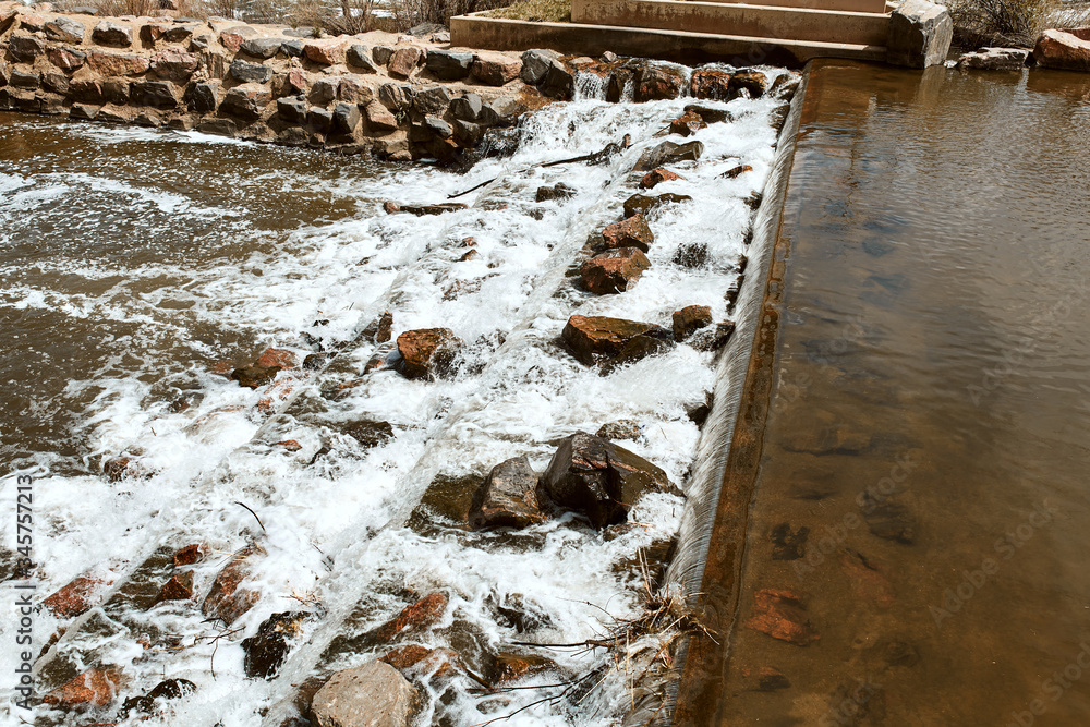Closeup of cascading water on South Platte River at Confluence Park in Denver, Colorado. Closeup of cascading water on South Platte River at Confluence Park in Denver, Colorado.