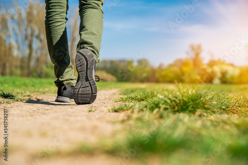 tourist walking along a hiking trail. copy space