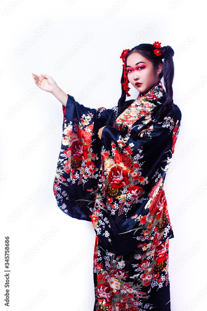 young pretty geisha in black kimono with sakura, asian ethno closeup on white background isolated young pretty geisha in black kimono with sakura, asian ethno closeup on white background isolated