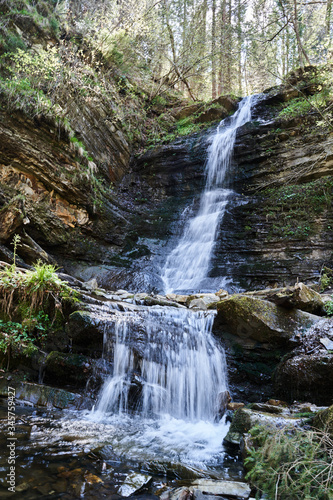 waterfall in mountains, untouched nature, mountain river