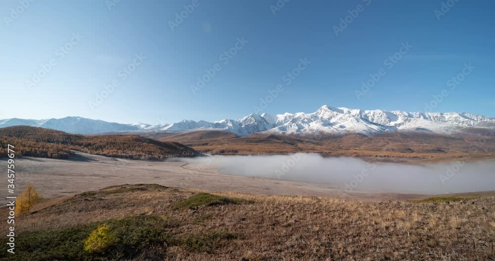 Fog flies over autumn mountains and forest. Fog flies over autumn mountains and forest.