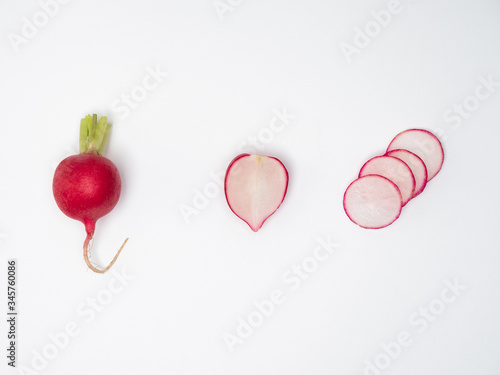 Set of fresh radishes in knolling concept on white background. photo