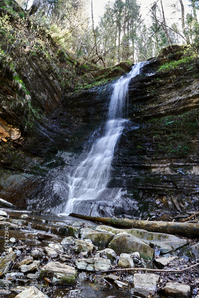 Fototapeta premium waterfall in mountains, untouched nature, mountain river