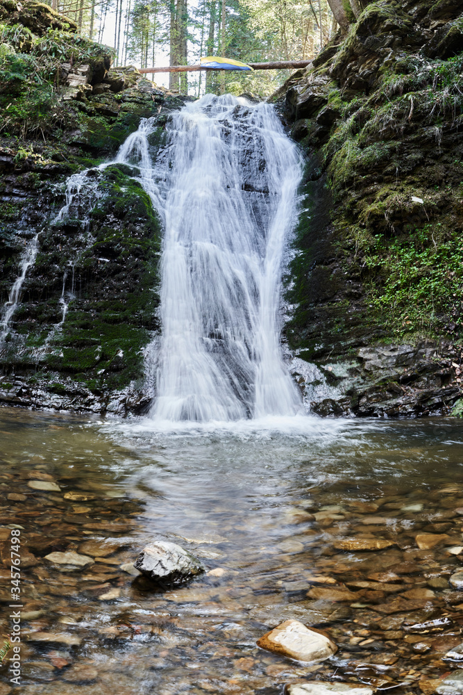 Fototapeta premium waterfall in mountains, untouched nature, mountain river