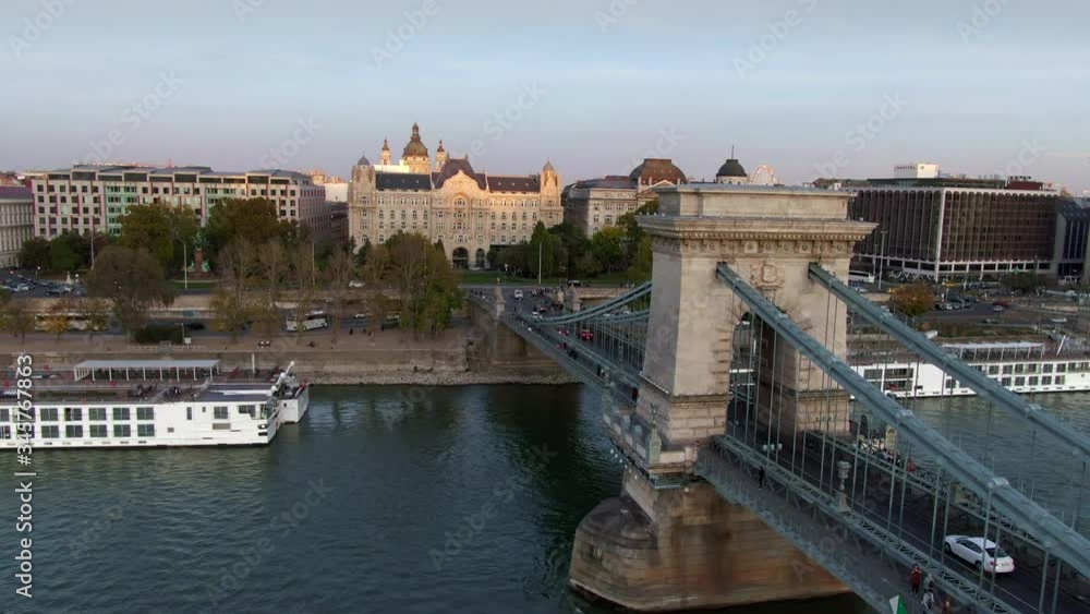 Budapest, Hungary, aerial view of historical landmark Szechenyi Chain Bridge over the Danube River at sunset.