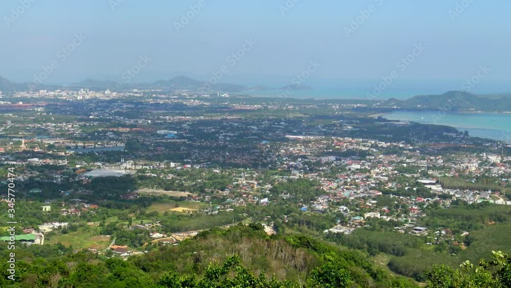 Panoramically view from the top of the hill over landscape at small touristic city in Phuket, Thailand. Panoramically view from the top of the hill over landscape at small touristic city in Phuket, Thailand.