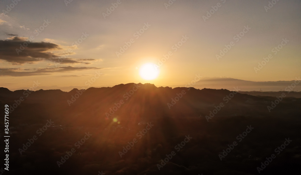 Silhouette of the Mountain by Sunset