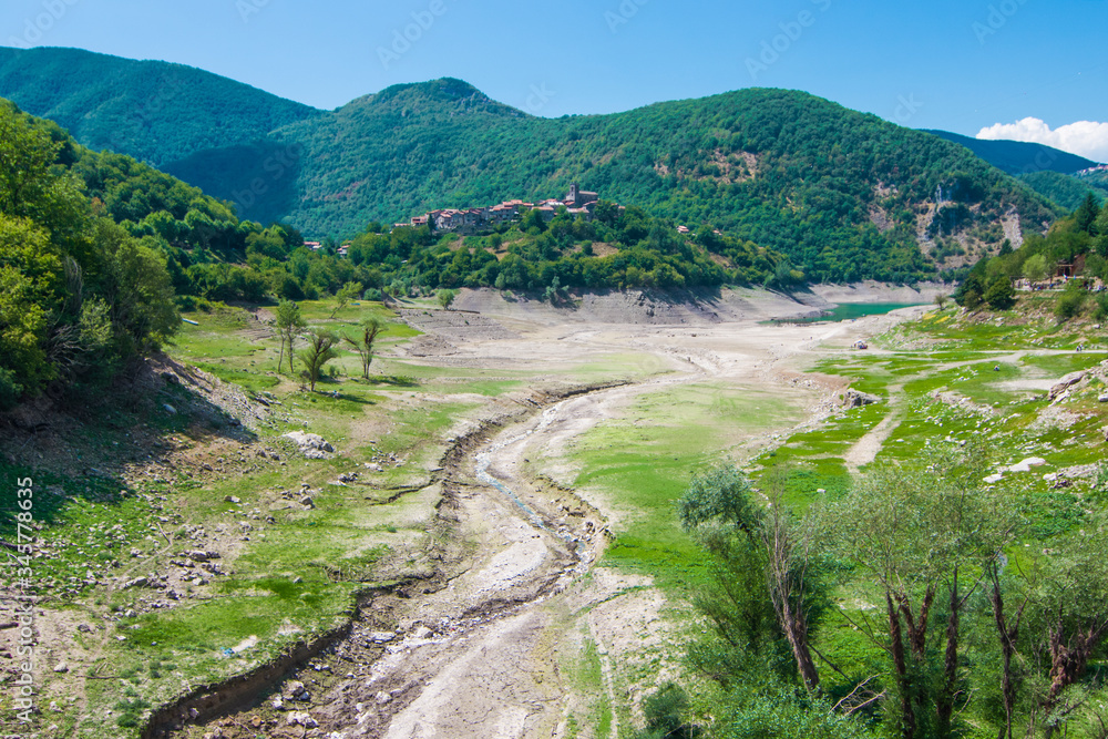 drought and temperature rise catastrophe, dry river and town without water. drought and temperature rise catastrophe, dry river and town without water.