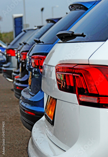 Cars in a row gleaming