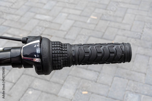 right hand handle of a bicycle showing the gear changer photo