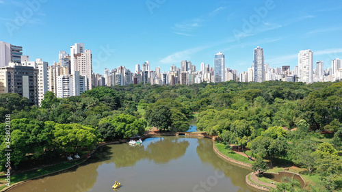 Scenic view of the Zoo in Goiania with several lakes, tropical trees and luxury residential buildings. Goiania, Goias, Brazil 