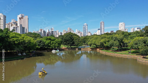 Scenic view of the Zoo in Goiania with several lakes, tropical trees and luxury residential buildings. Goiania, Goias, Brazil 