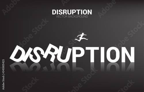 Silhouette of businessman jump away from collapse domino. business concept of business disruption and domino effect