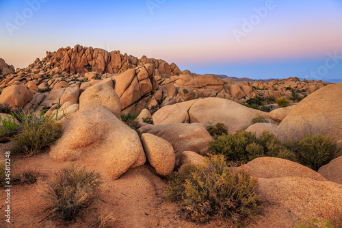 Fotografija Sunset on the Jumbo Rocks of Joshua Tree National Park, California