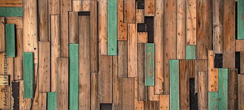 木材のパッチワークによる装飾的な外観の背景テクスチャー