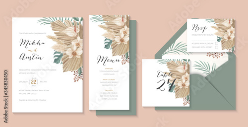 Modern bohemian tropical wedding invitations set with dried palm, pampas grass, monstera, calla lily and orchid
