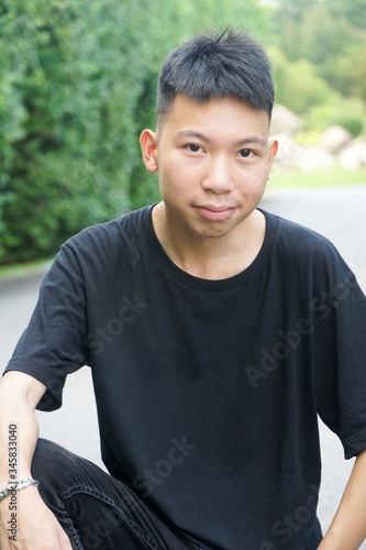 close up young man in nature garden