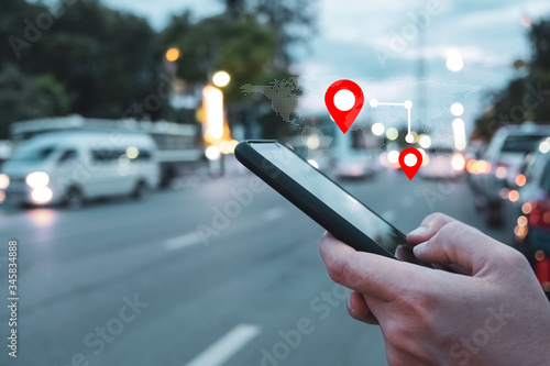 People use smartphone to check map to travel with internet and gps application for vacation. photo