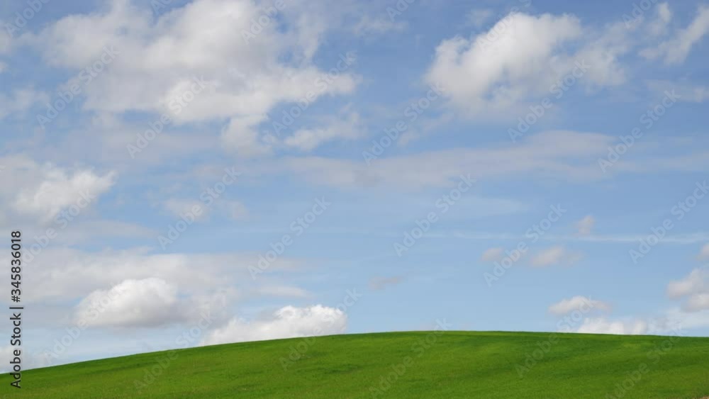 WS Blue sky and clouds over green field WS Blue sky and clouds over green field