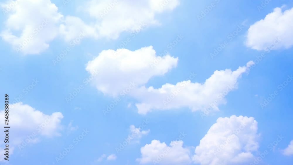 Summer clear sky moving motion. White puffy cloud rolling separately. Summer clear sky moving motion. White puffy cloud rolling separately.