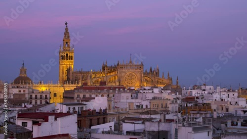 WS Dusk over city of Seville with cathedral and La Giralda bell tower