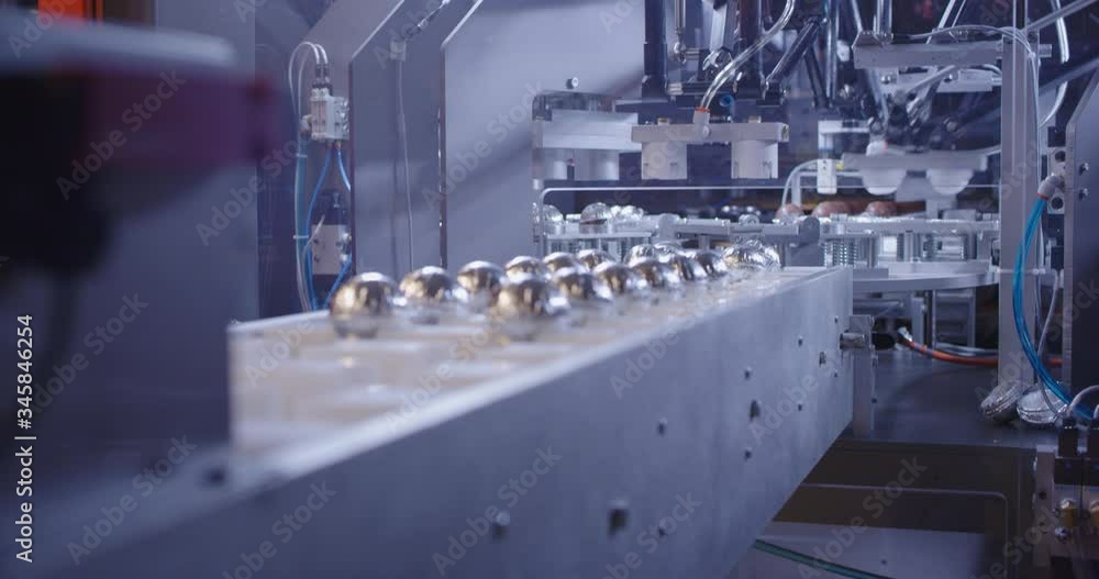 Chocolate candy on production packaging line Chocolate candy on production packaging line