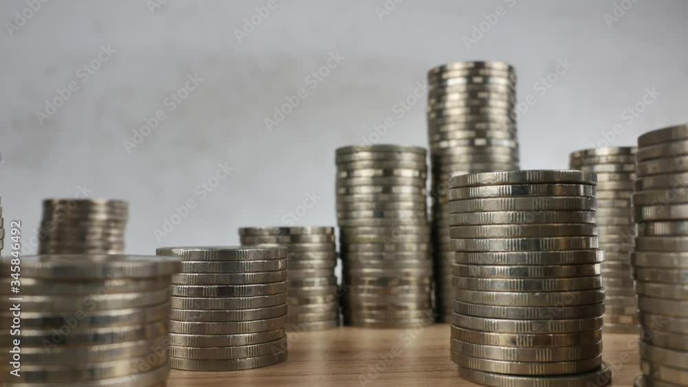 coin stack on the table, panning video coin stack on the table, panning video