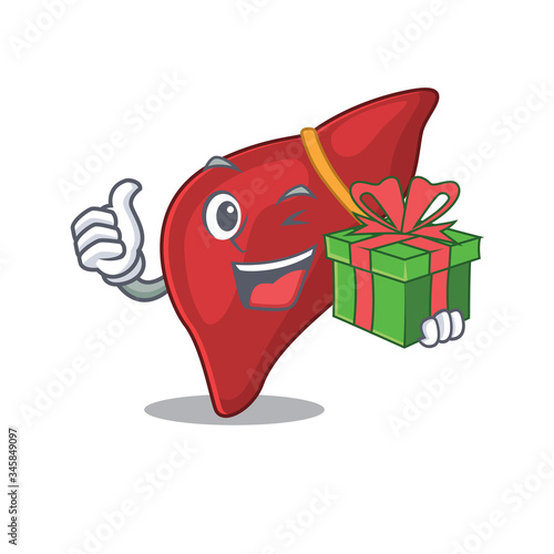 Smiling healthy human liver cartoon character having a green gift box