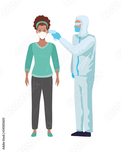 worker using biosafety suit with thermometer and woman