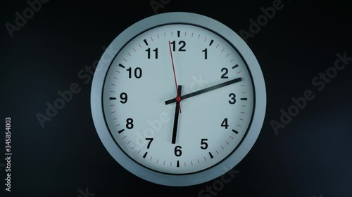 Wallpaper Mural Gray wall clock isolated face beginning of time 06.00 am or pm. on black background, Time lapse 60 minutes moving fast, Time concept. Torontodigital.ca