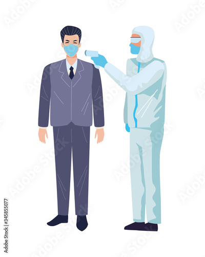worker using biosafety suit with thermometer and person