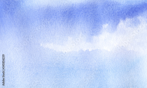 Abstract watercolor background of blue shades. Gentle blue sky with fluffy white clouds. Hand drawn illustration of summer soft heaven on textured paper. White paint stains on uneven azure backdrop