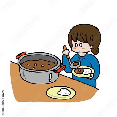 カレーをよそう女の子