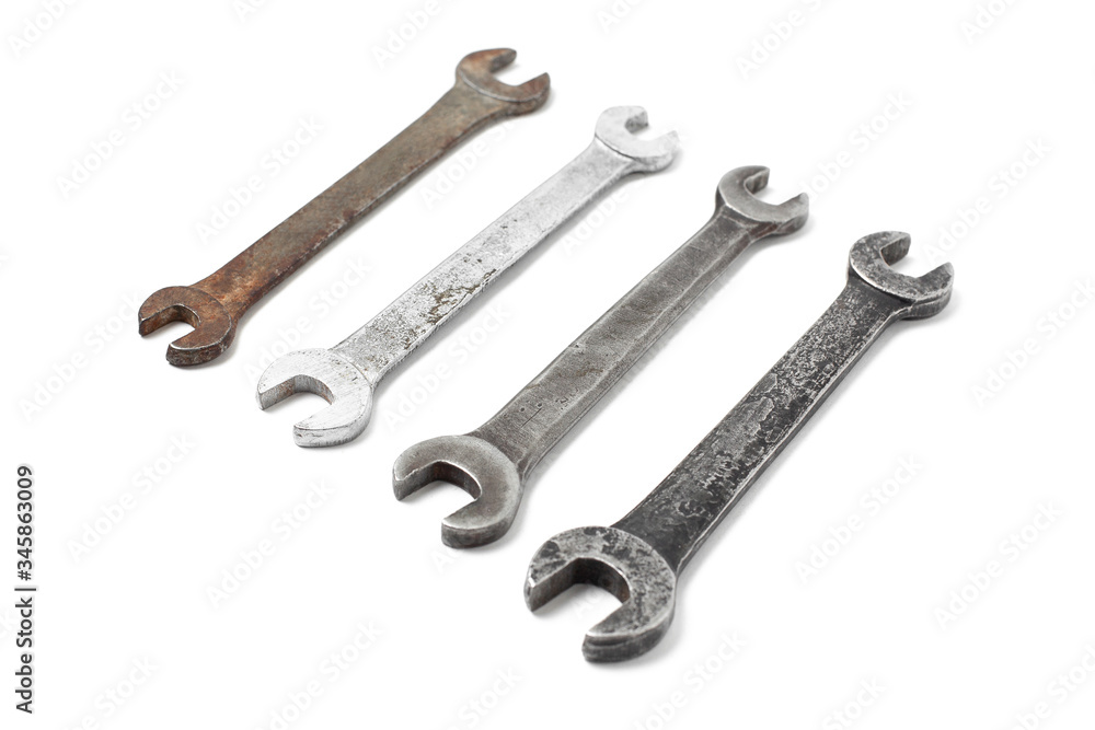 Group of old wrench tools isolated on white background Group of old wrench tools isolated on white background