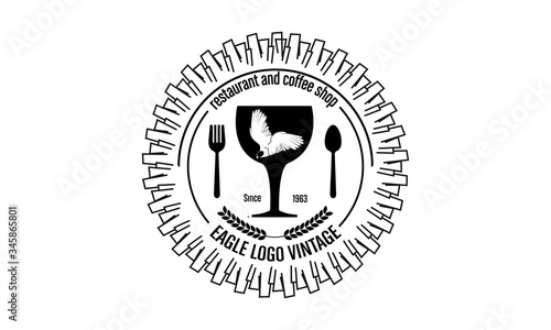 logo of the restaurant's emblem, vintage style with an eagle theme photo