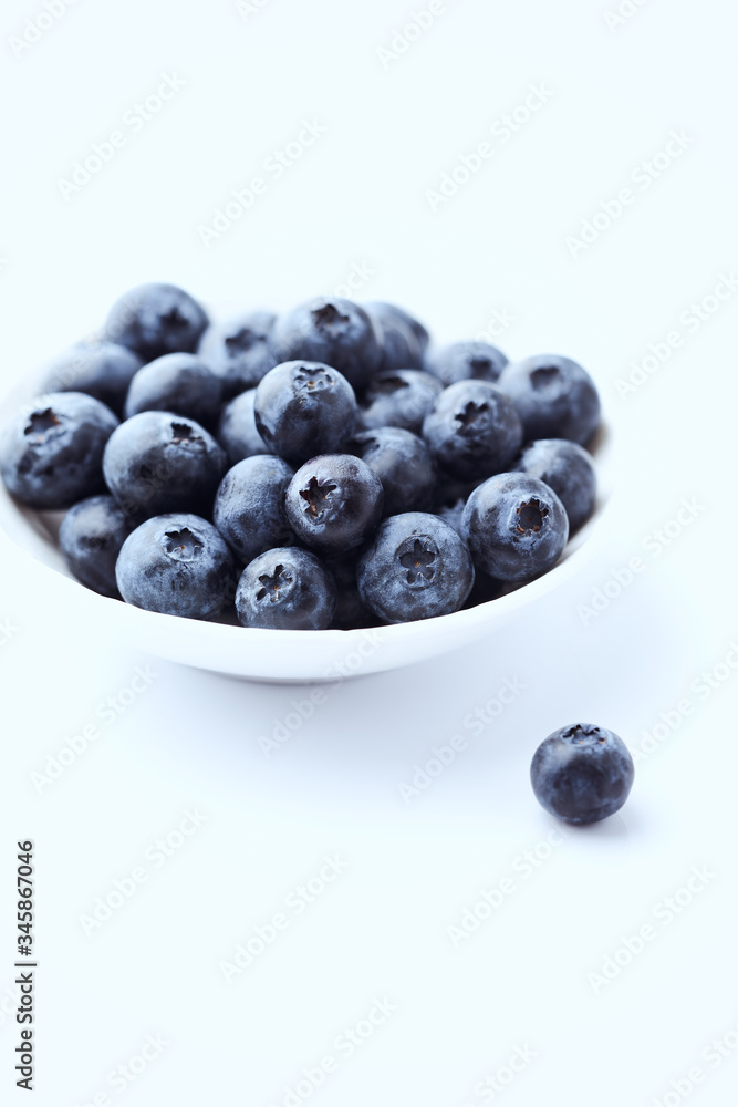 Bilberries isolated on white background. Concept for healthy nutrition. Copy space. Bilberries isolated on white background. Concept for healthy nutrition. Copy space.