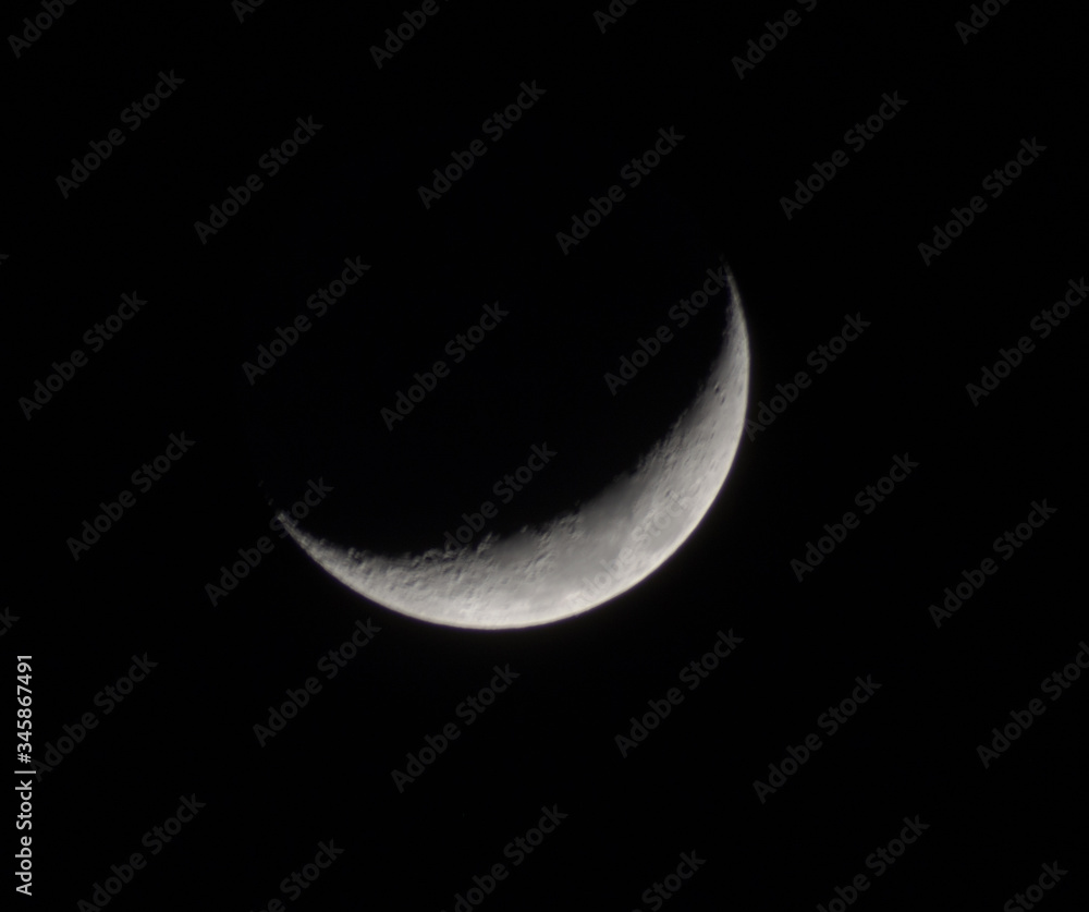 Crescent moon in black background Crescent moon in black background