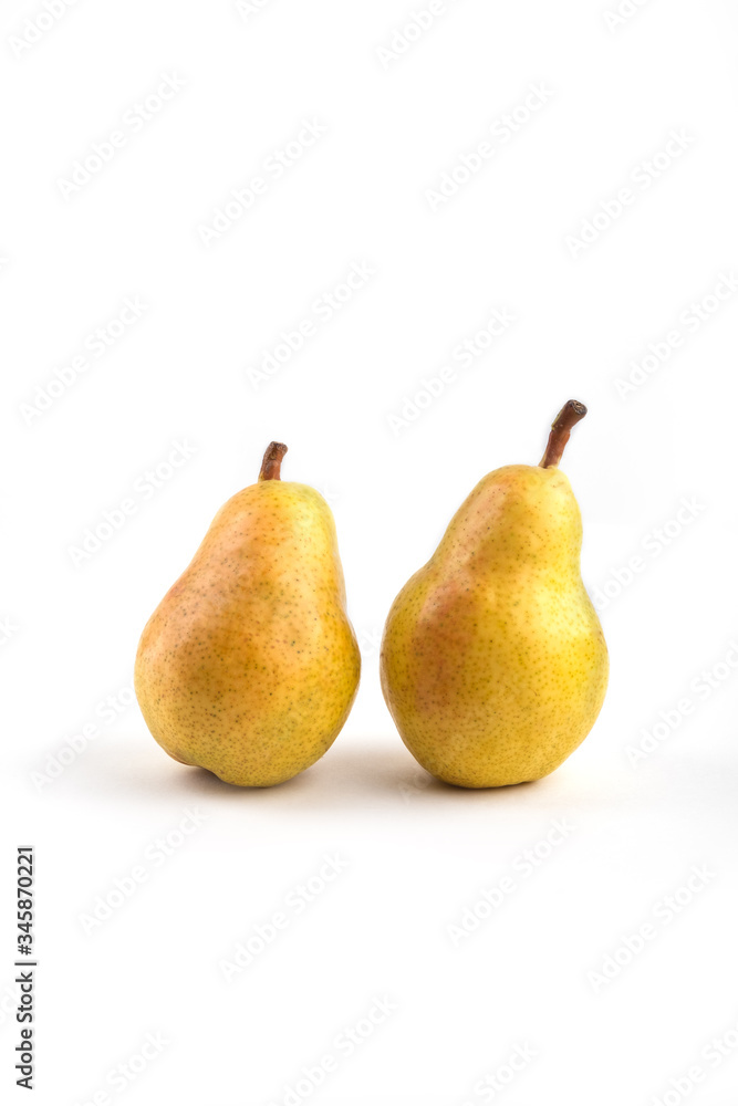 Fresh yellow pears with leaf isolated on white background. Fresh yellow pears with leaf isolated on white background.