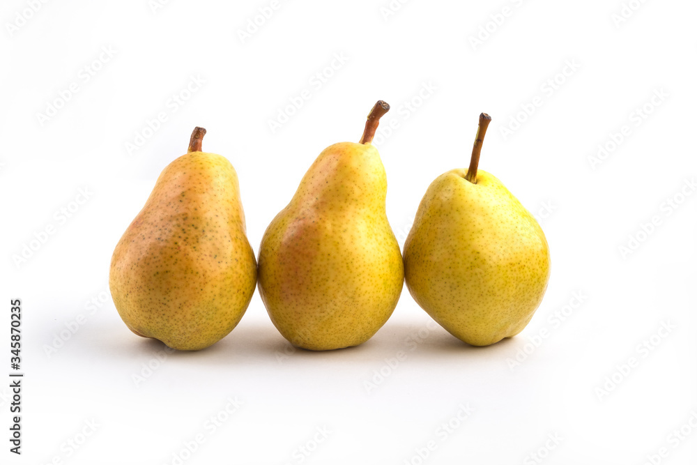 Fresh yellow pears with leaf isolated on white background. Fresh yellow pears with leaf isolated on white background.